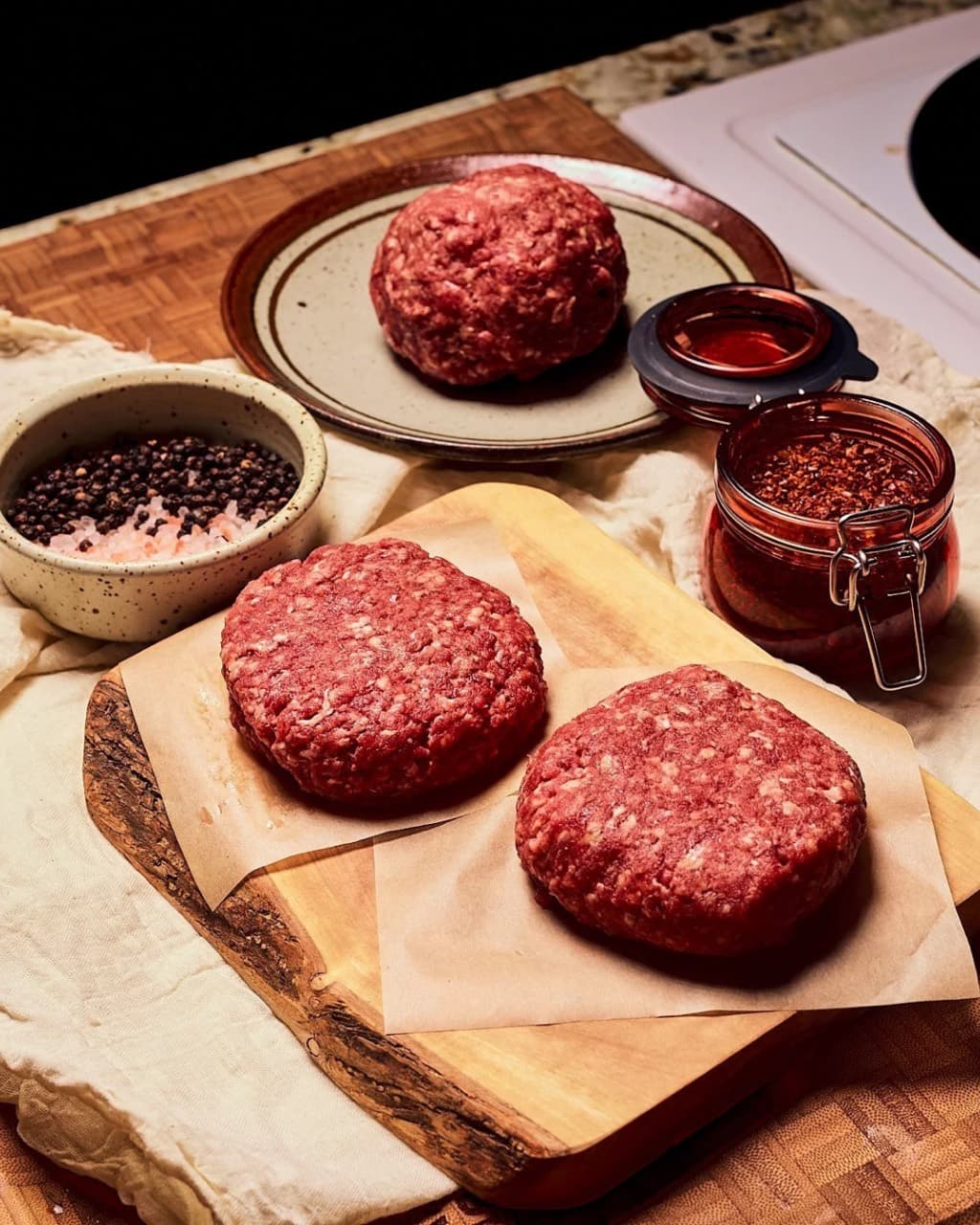 Beef patties and ground beef with salt, pepper and spices